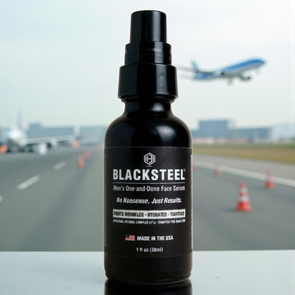 BLACKSTEEL Flight Mode 1 oz. men’s wrinkle serum with airplane background, TSA-approved travel skincare